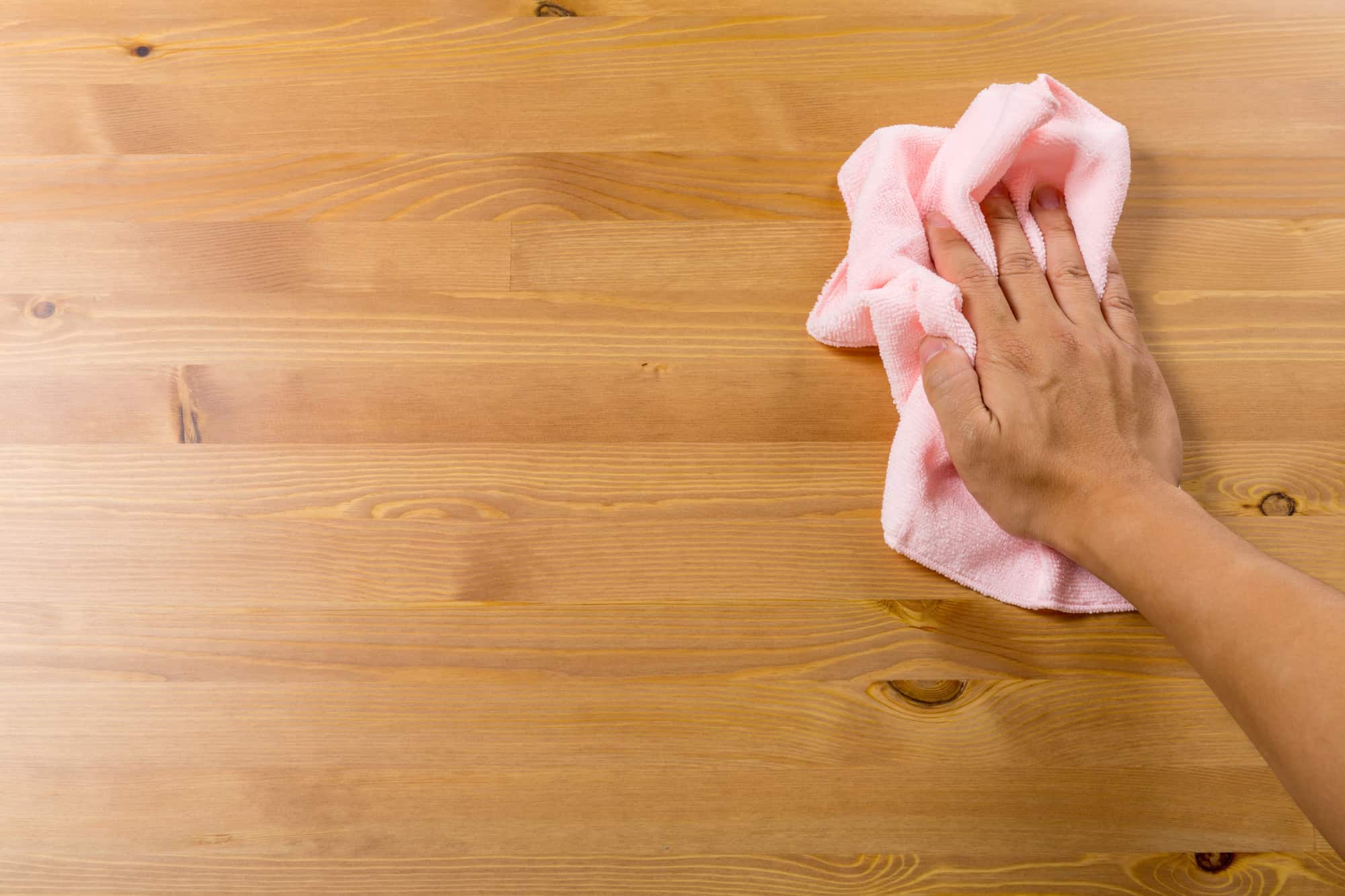 Cleaning table by hand