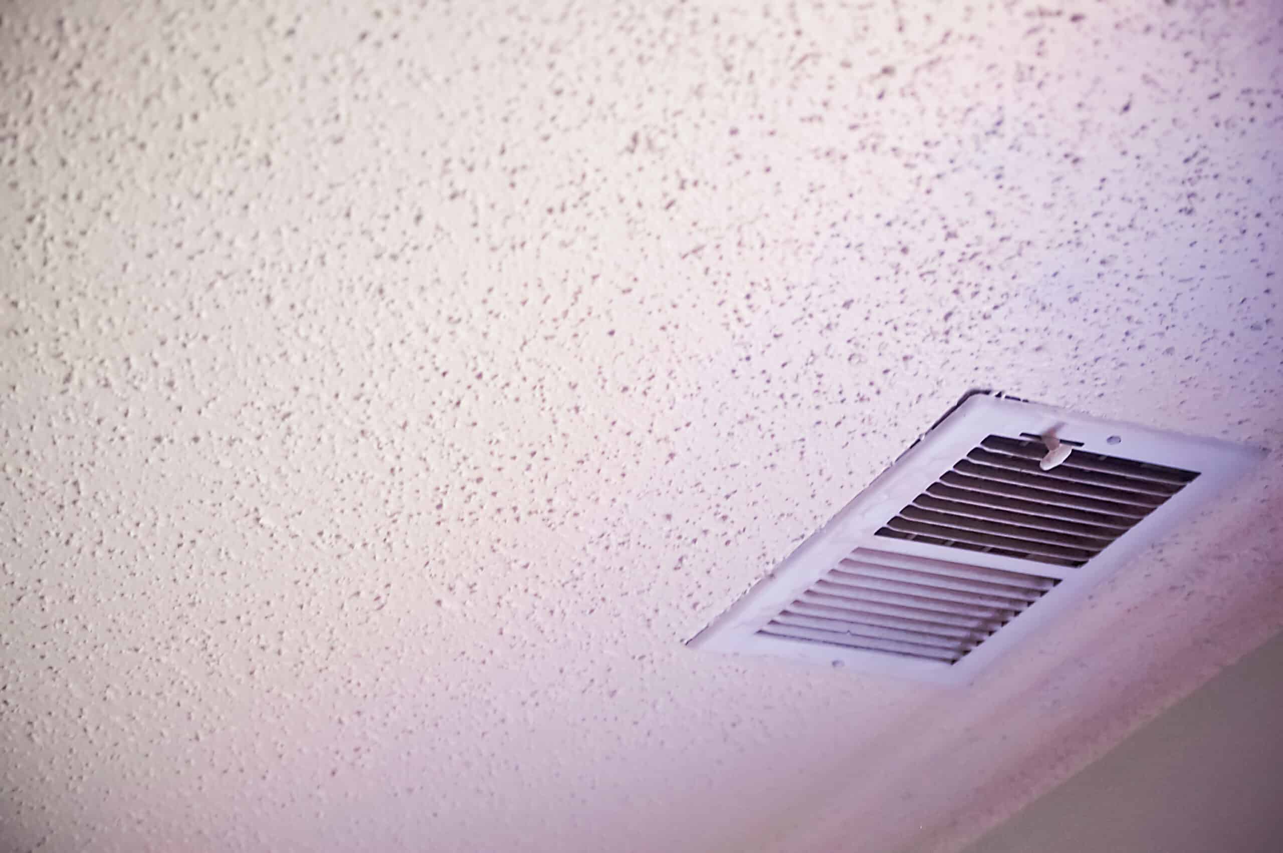 Popcorn ceiling with a heating or cooling vent.