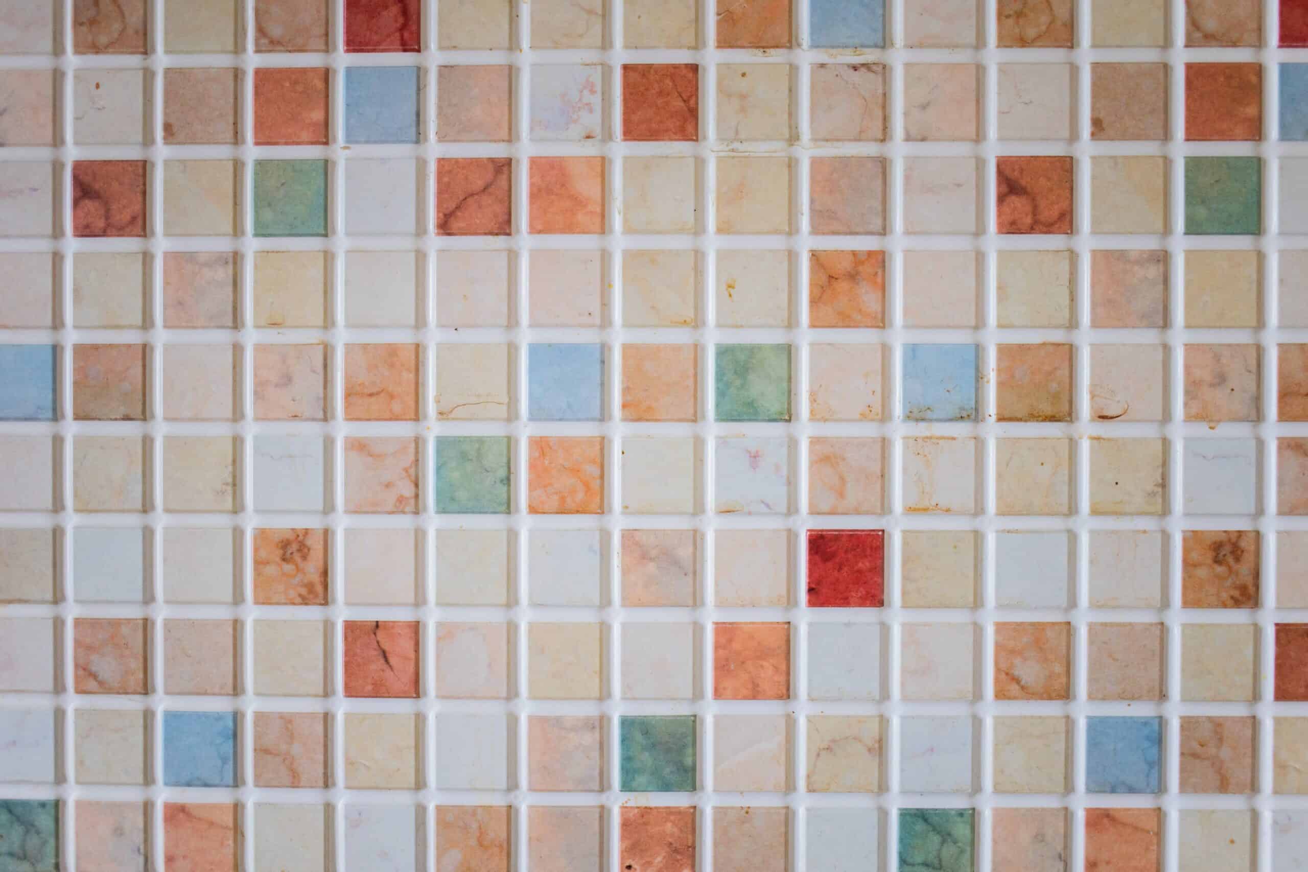 Ceramic tiles with grout after cleaning with homemade grout cleaner recipe.