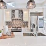 Modern kitchen with marble countertops.