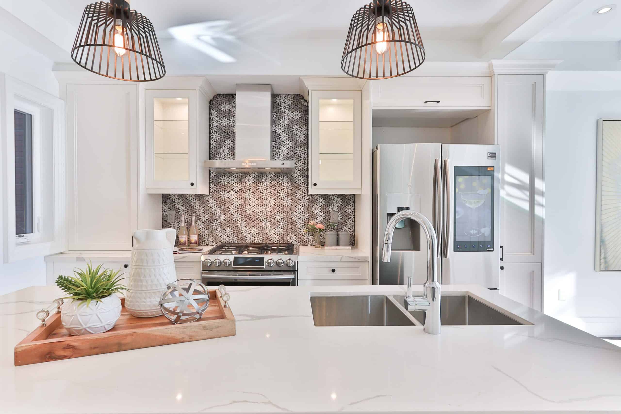 Modern kitchen with marble countertops.