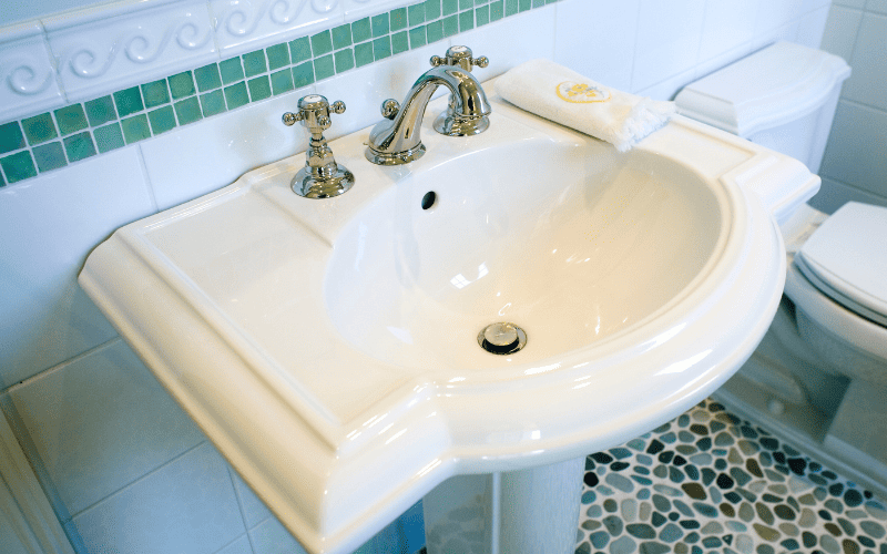 Porcelain sink in a bathroom.