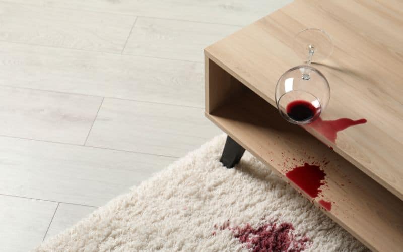 Red wine spilt on carpet.