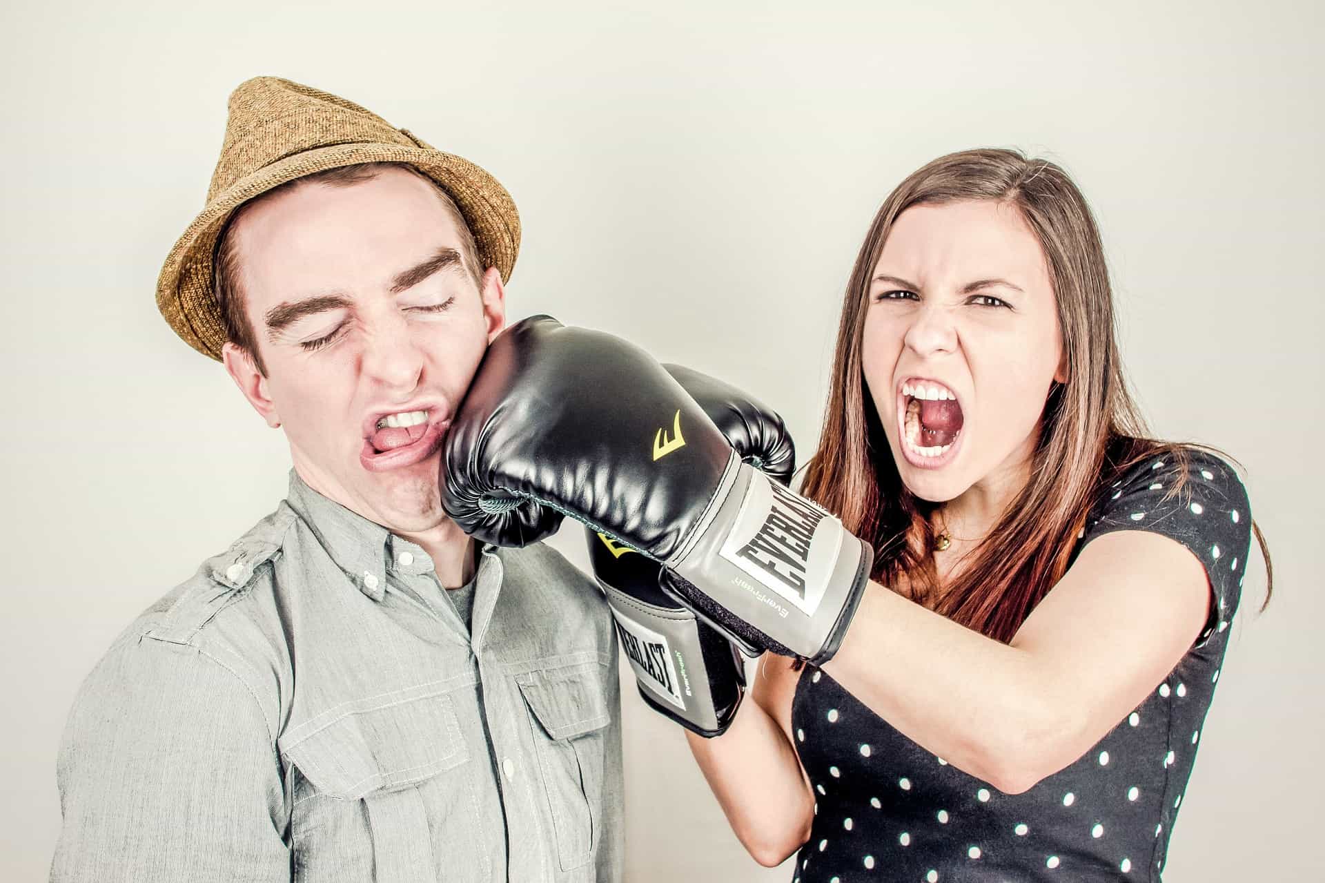 Woman punching man.