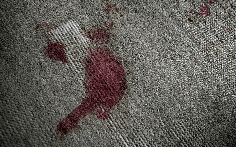 Blood stain on carpet.