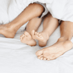 Intimate in bed.