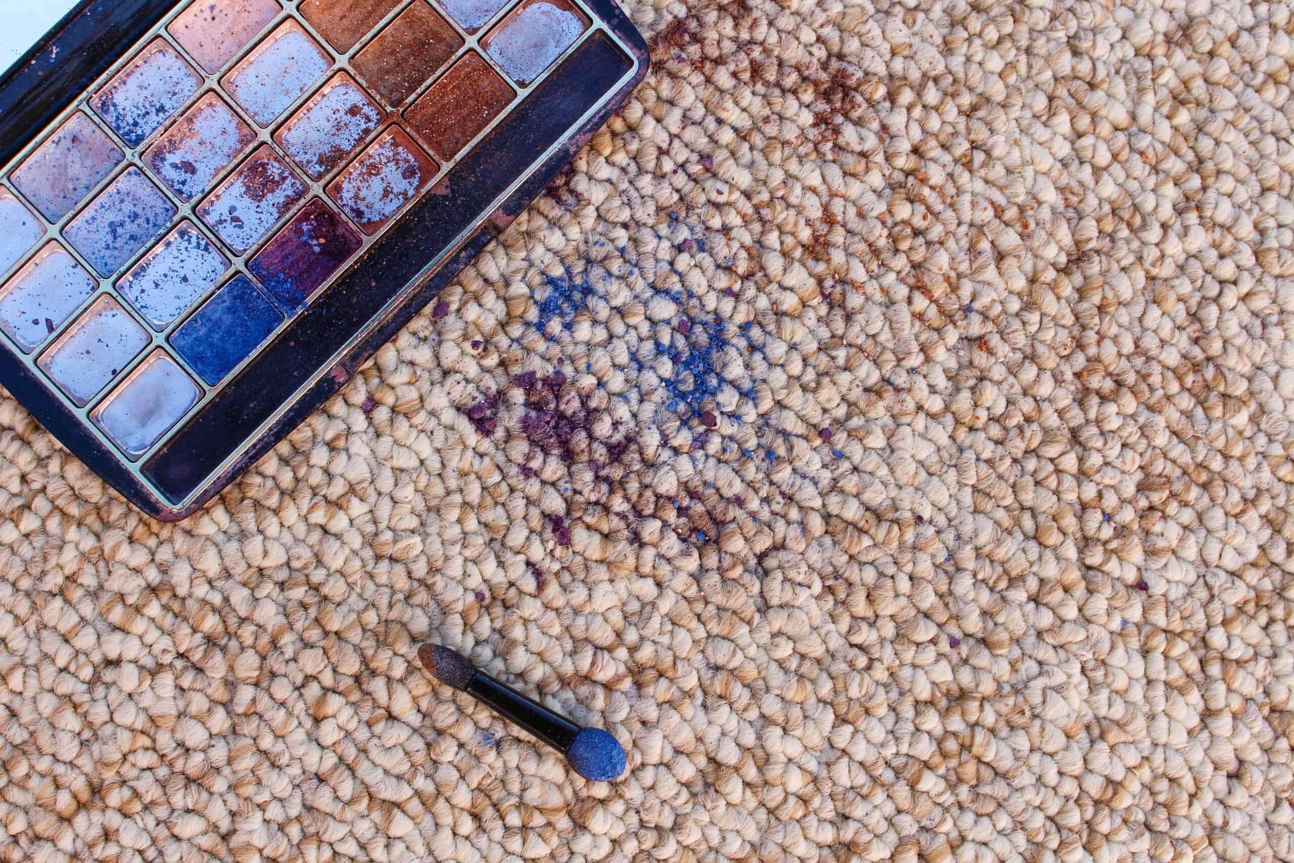 Eye shadow on carpet.